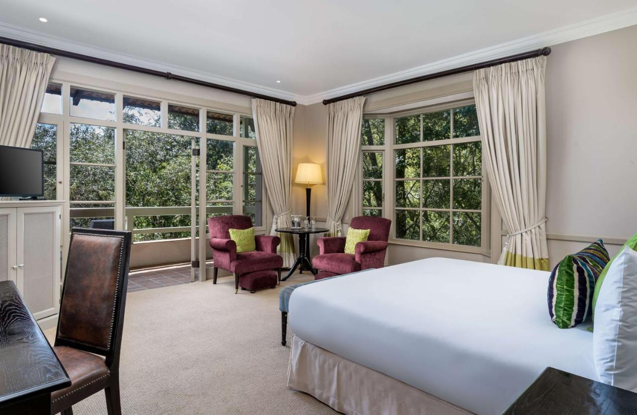 Mount Grace Hotel & Spa Magaliesburg Bagian luar foto A bedroom at the hotel