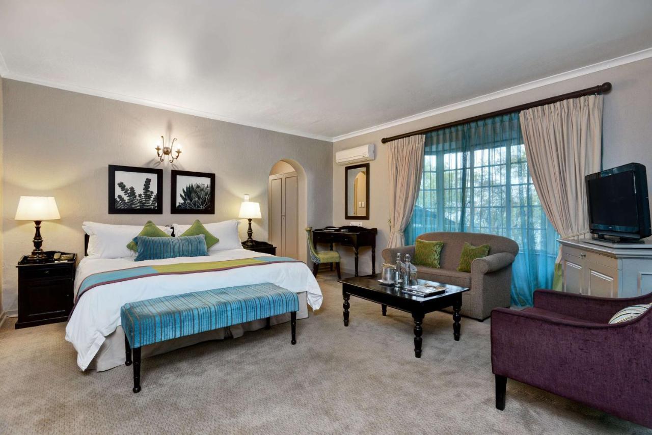 Mount Grace Hotel & Spa Magaliesburg Bagian luar foto A bedroom at the Taj Bengal