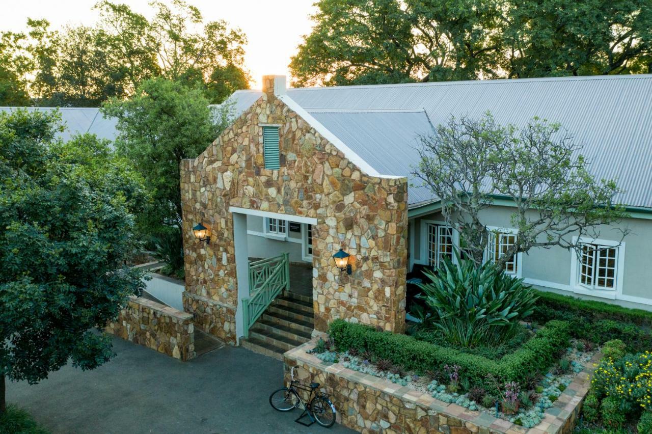 Mount Grace Hotel & Spa Magaliesburg Bagian luar foto The entrance to the main house